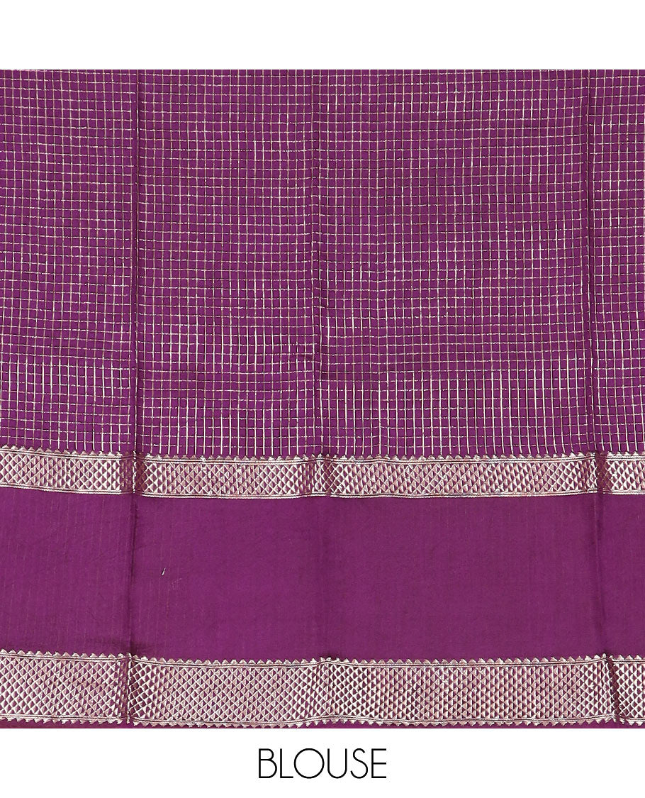 Yellow micro-checked assam silk saree, contrast traditional zari border of floral designs, and zari striped pallu