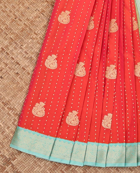 Orange Budget Silk Saree, Beautifully Bedecked with Zari Buttas on Its Body, Complemented by a Contrast Traditional Zari Border of Peacock Designs, Grand Geometric-Patterned Pallu, and Paired with a Contrast Blouse