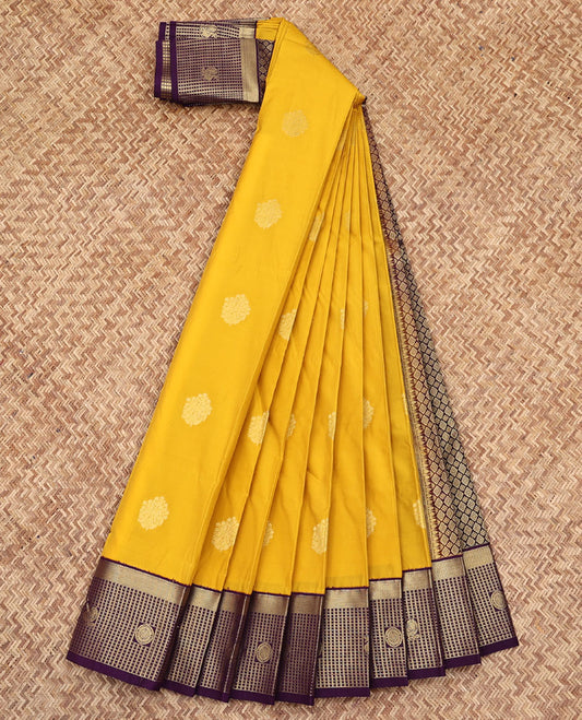 Yellow Budget Silk Saree, Bedecked with Zari Buttas All Over Its Body, Complemented by a Contrast  Zari Checked Border of Peacock-Chakram Designs, Grandly Woven Jaal Pallu, and Paired with a Contrast Blouse