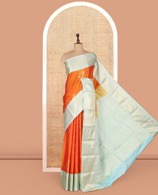 Orange Budget Silk Saree, Gracefully Embellished with Zari Buttas on Its Body, Complemented by a Contrast Traditional Zari Design Border, Intricately Designed Pallu, and Paired with a Contrast Blouse