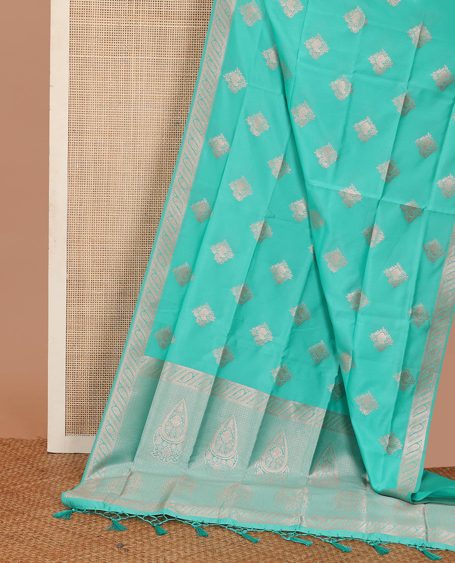 Turquoise butter silk saree with zari buttas, floral zari design border & intricate pallu