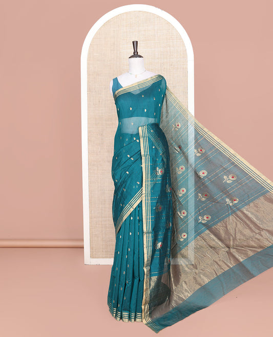 Blue Chanderi Cotton Saree, Woven with Paisley Buttas All Over Its Body, Highlighted by a Zari Border, Pallu Steeped with Zari Stripes and Buttas, and Paired with a Matching Blouse
