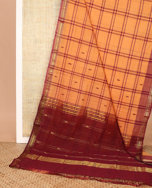 Orange buttas enclosed, checked Andhra cotton saree, zari design border, and contrast zari design pallu