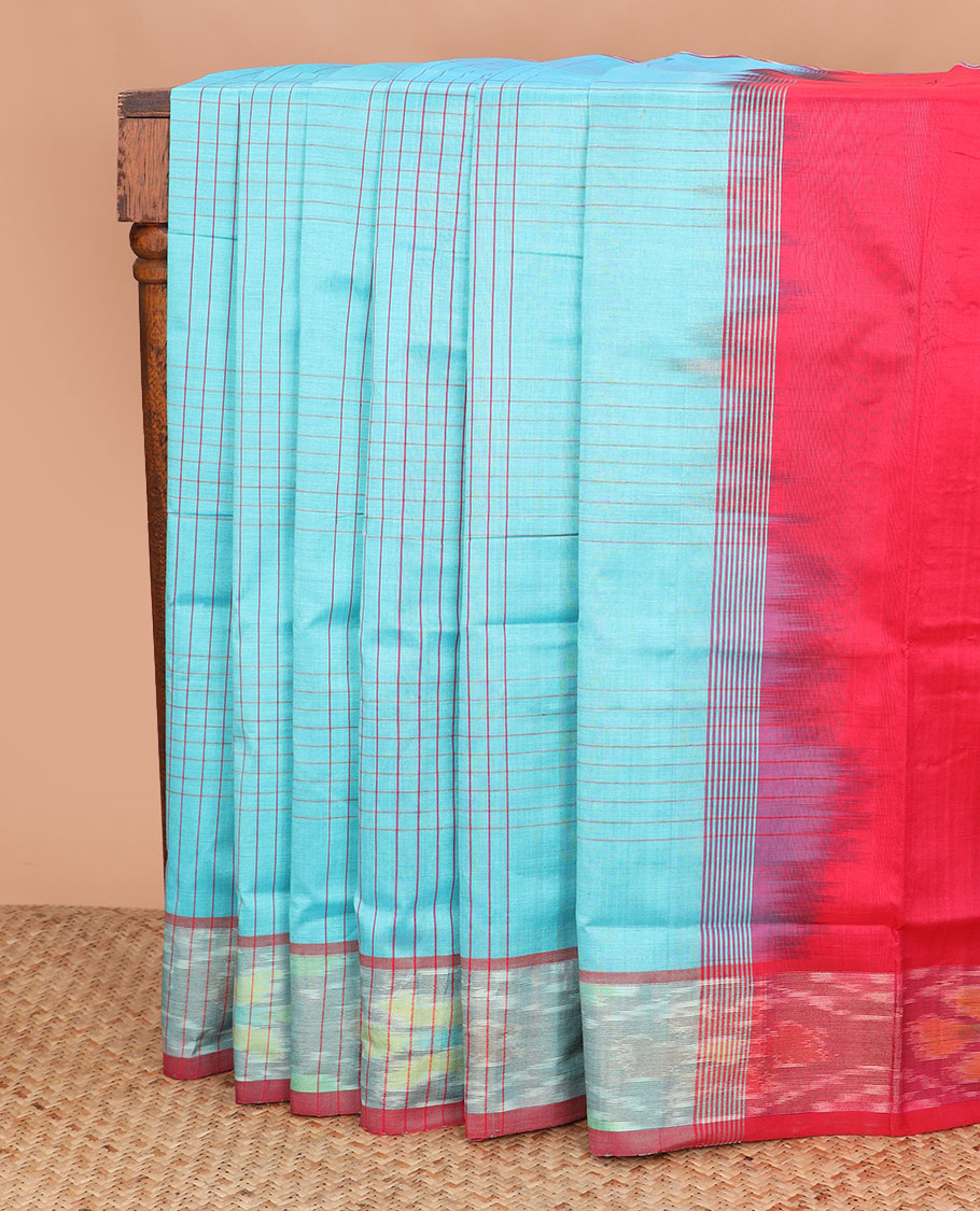 Blue checked poly cotton saree, contrast ikkat border, and striped pallu