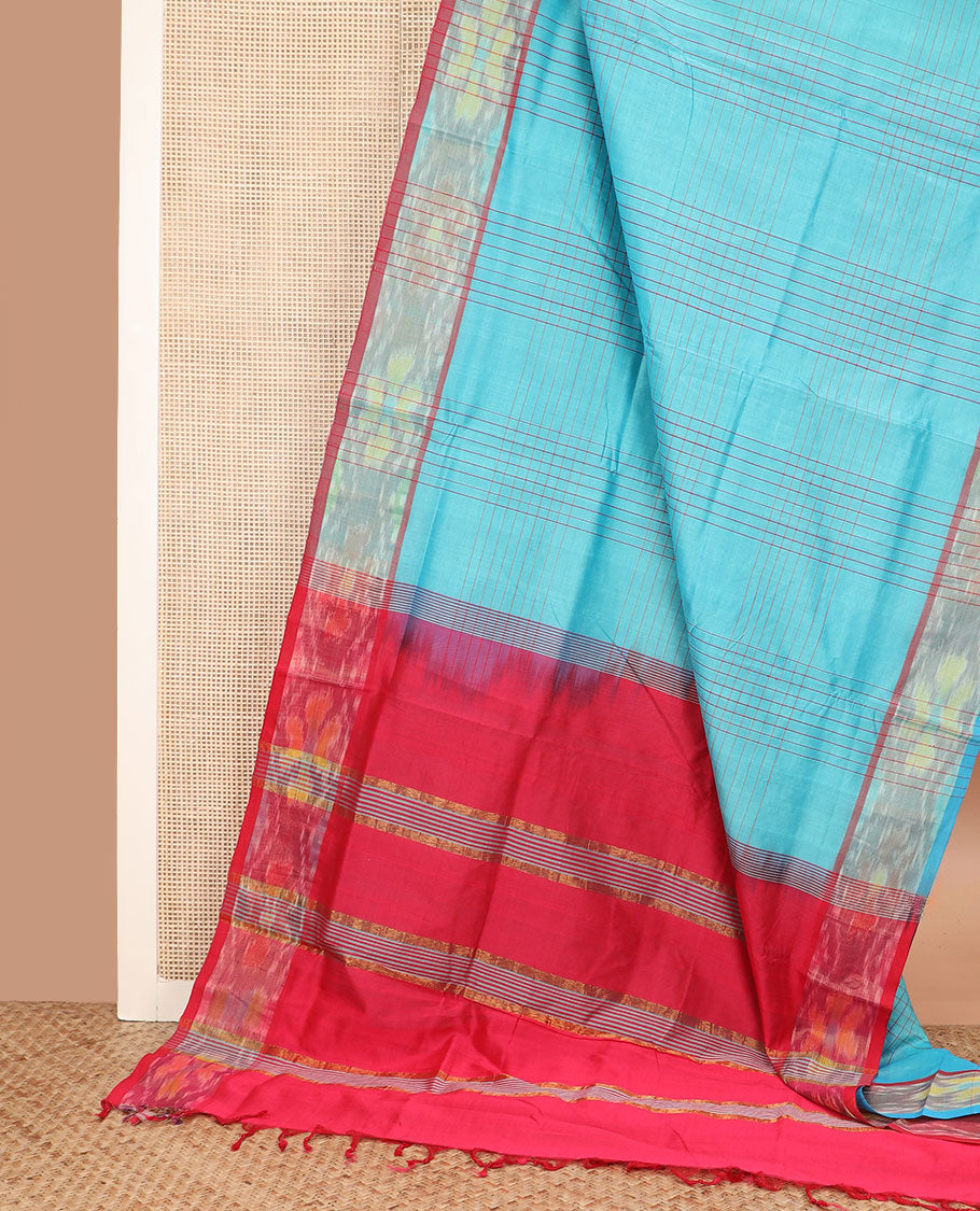 Blue checked poly cotton saree, contrast ikkat border, and striped pallu