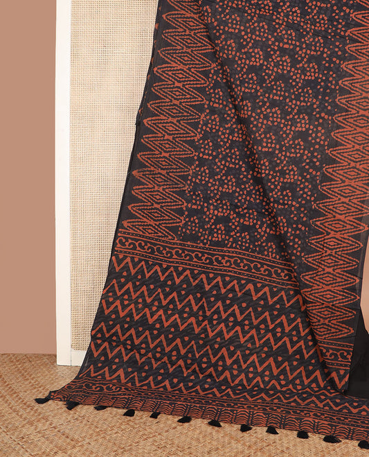 Black polka dots printed cotton saree, geometric printed border, and pallu