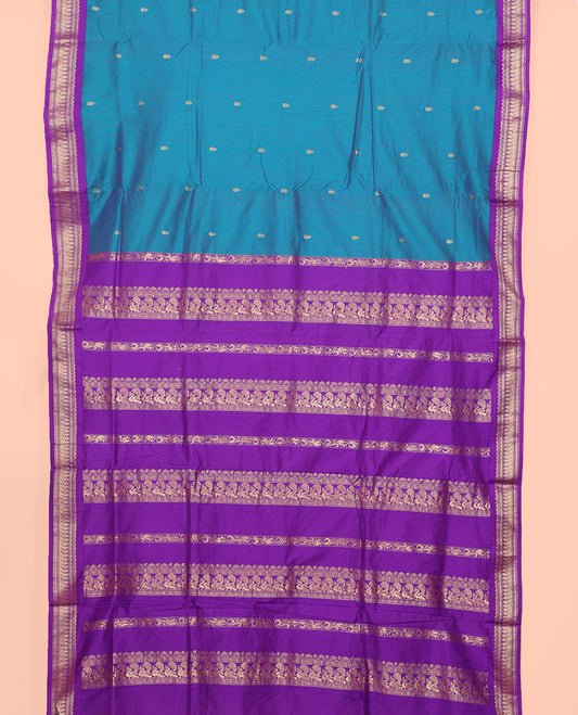 Blue Nine Yard Cotton Saree, Adorned with Buttas On Its Body, Complemented by Contrast Traditional Zari Motifs Border, Pallu of Traditional Designs, and Comes Without a Blouse