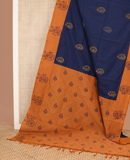 Navy blue block printed buttas poly cotton saree, contrast floral printed border, and pallu of butta enclosed jaal design