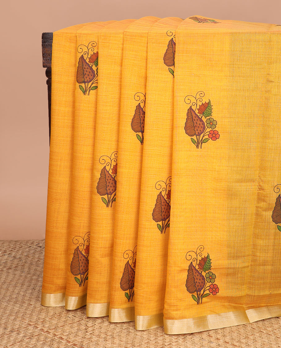 Yellow floral-leaf buttas printed chirala cotton saree, bavanji border, and contrast musical motifs print pallu