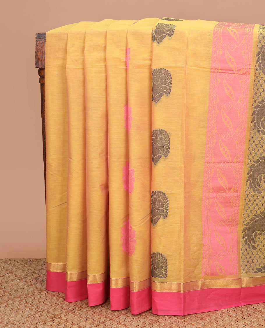 Yellow buttas kanchi cotton saree, contrast plain border, and paisley pallu