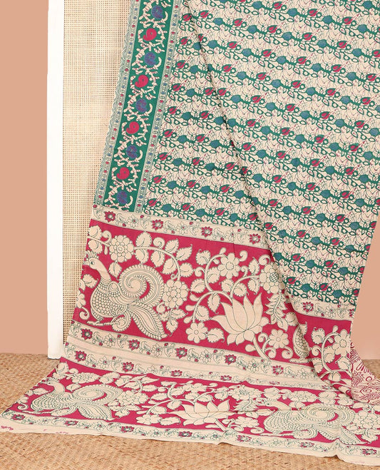 Blue Machine-Printed Kalamkari Cotton Saree, Delicately Printed with Batik-Style Leaf Printed on Its Body, Batik Paisley Printed Border, Pallu of Floral and Peacock Print, and Paired with a Printed Blouse