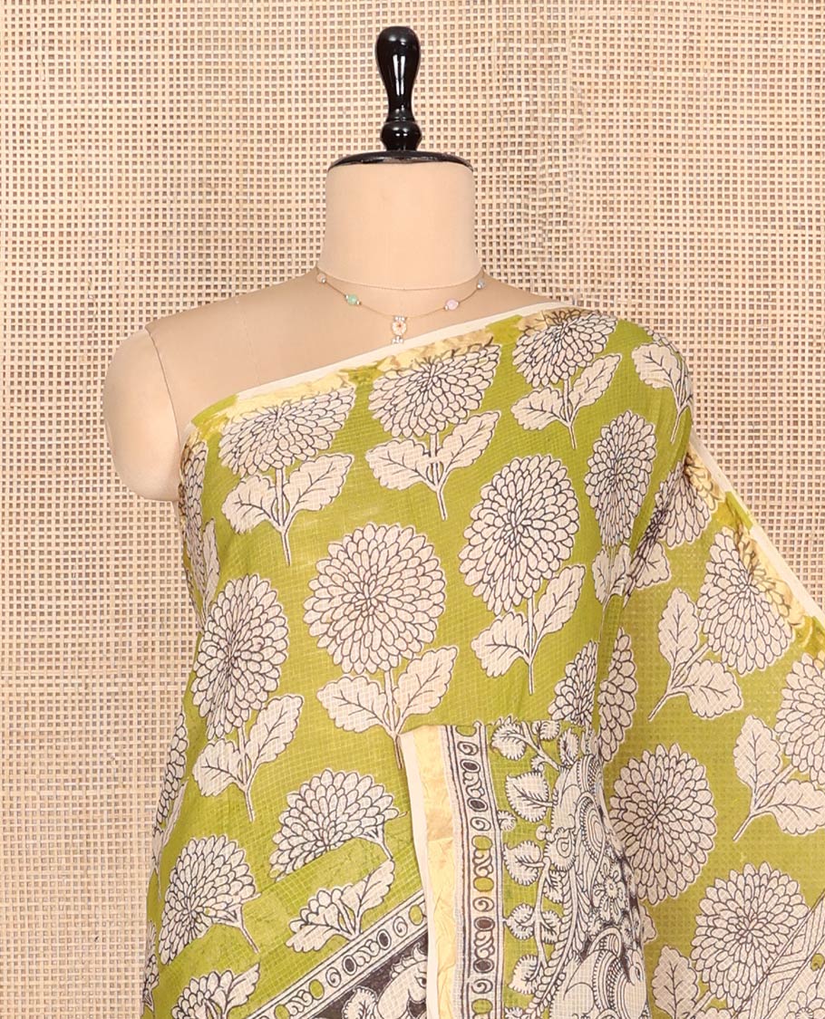 Green Machine-Printed Kalamkari Cotton Saree Features Floral Motifs, a Piping Border, Pallu of Lord Krishna Motifs, and a Matching Blouse