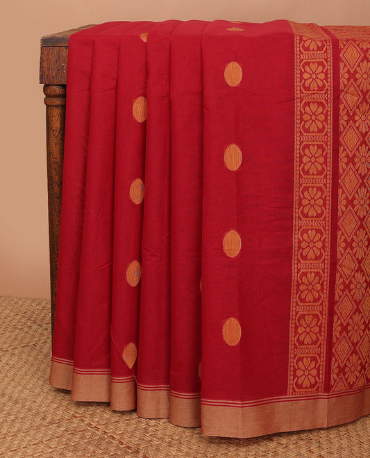 Red kanchi cotton saree with polka dot buttas, contrast border & jaal design pallu