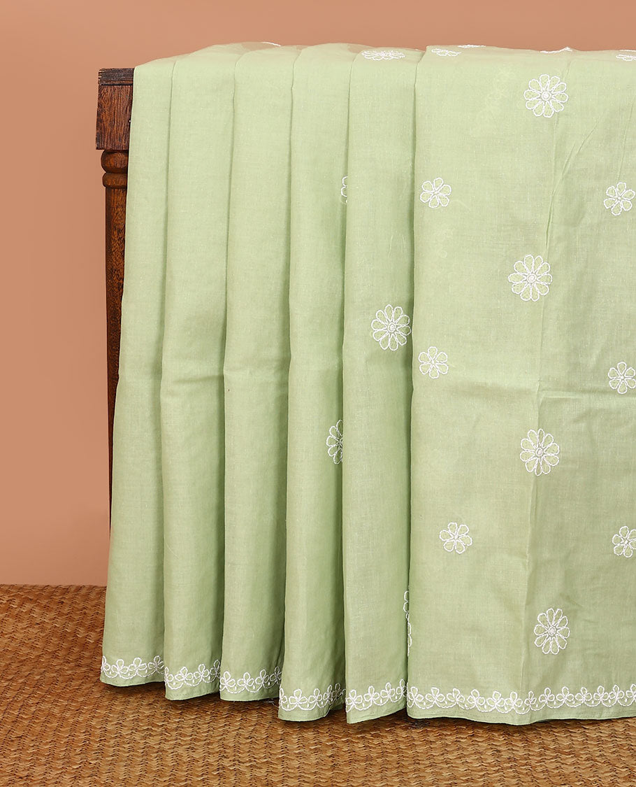 Elaichi green floral thread embroidered buttas Lucknowi chikankari saree, thread embroidered border, and floral embroidered pallu
