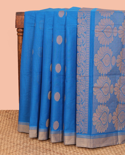 Blue Kanchi Cotton Saree, Elevated with Polka Dot Buttas All Over Its Body, Complemented by a Contrast Border, Pallu Features Floral Designs, and Paired with a Matching Blouse