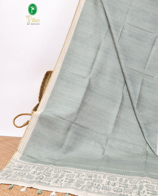 Green semi-banaras tussar saree with contrast striped border & egypt theme pallu