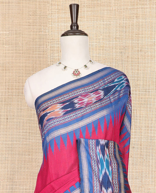 Pink Plain Dupion Silk Saree, Captivated by a Contrast Temple Border of Geometric Patterns and Ikkat Weave, Pallu Depicting Floral Ikkat Designs, and Paired with a Contrast Blouse
