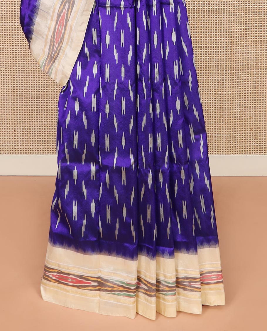 Blue Ikkat Silk Saree with Buttas Across the Body, Highlighted by a Contrast Ikkat-Textured Border, and Pallu Features Stripes and Ikkat Texture