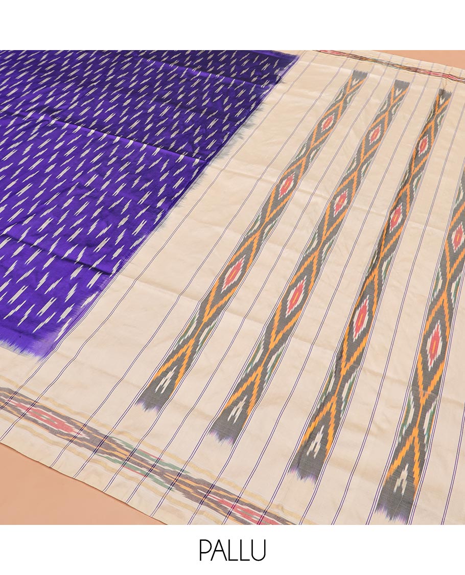 Blue Ikkat Silk Saree with Buttas Across the Body, Highlighted by a Contrast Ikkat-Textured Border, and Pallu Features Stripes and Ikkat Texture