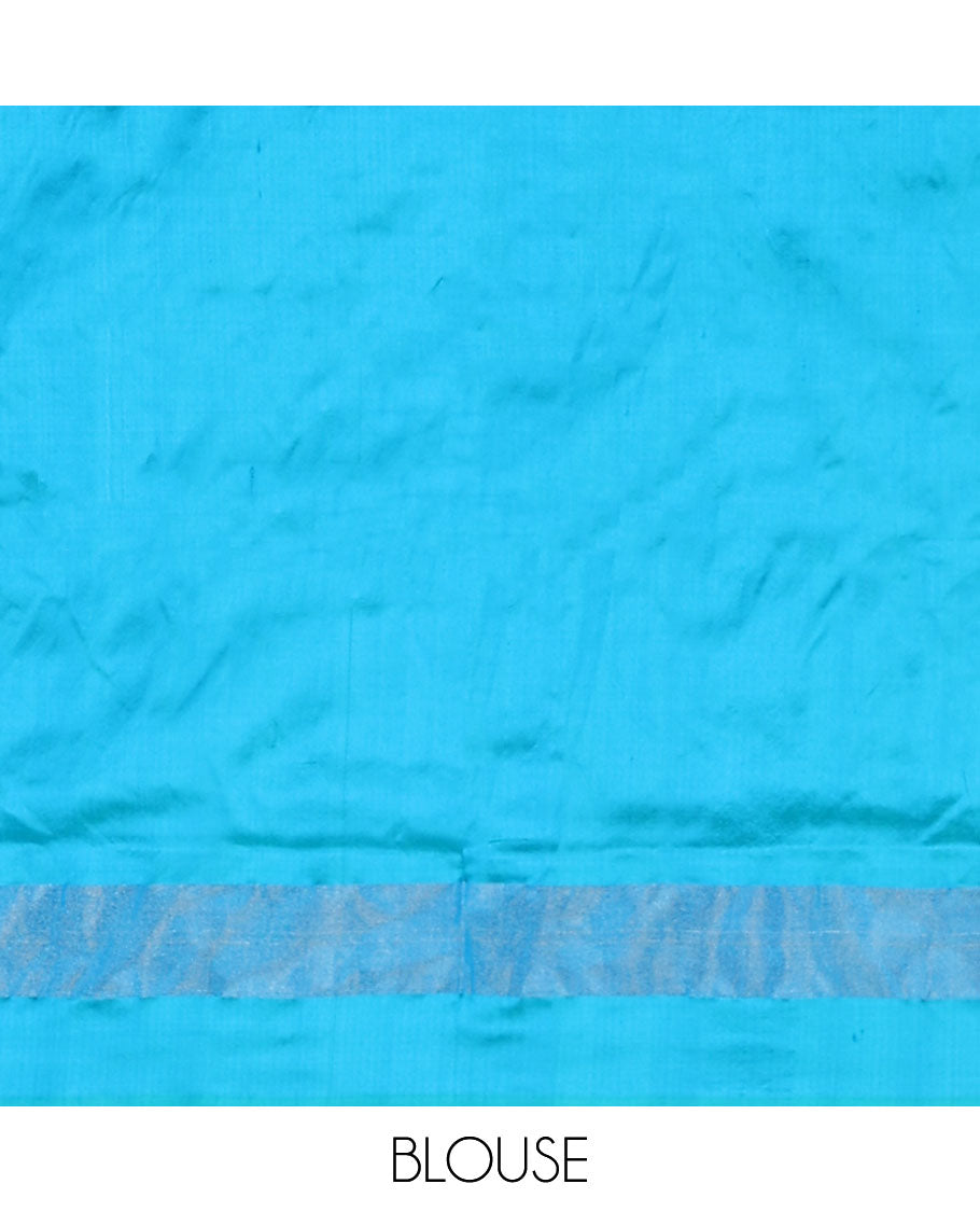 Green ikkat saree with ikkat buttas, contrast plain border & pallu of jaal design in ikkat weave