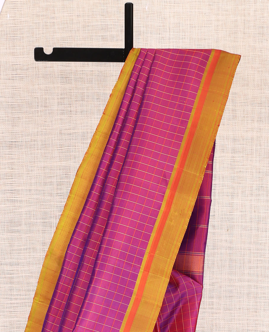 Purple Checked Kanchipuram Silk Saree, Complemented by a Contrast Border, Thazampoo Rekku Pallu, and Matching Blouse