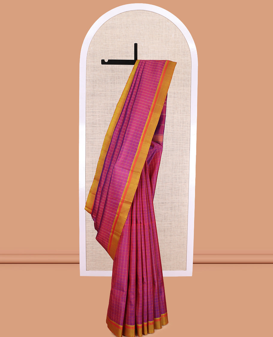 Purple Checked Kanchipuram Silk Saree, Complemented by a Contrast Border, Thazampoo Rekku Pallu, and Matching Blouse