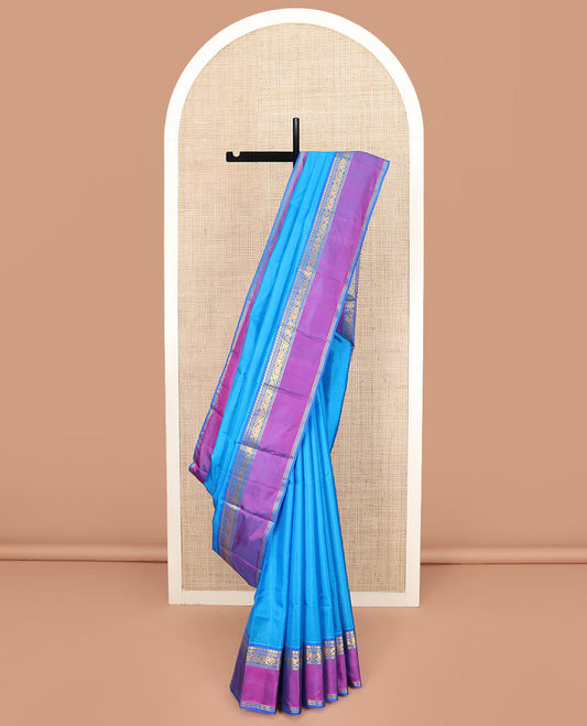 Blue Striped Kanchipuram Silk Saree Accentuated with Contrast Rettai Pettu Border Featuring Manga, Muthu, Banaras, and Kodi Visiry Designs, Subtly Woven Pallu with Stripes, and Paired with a Matching Blouse