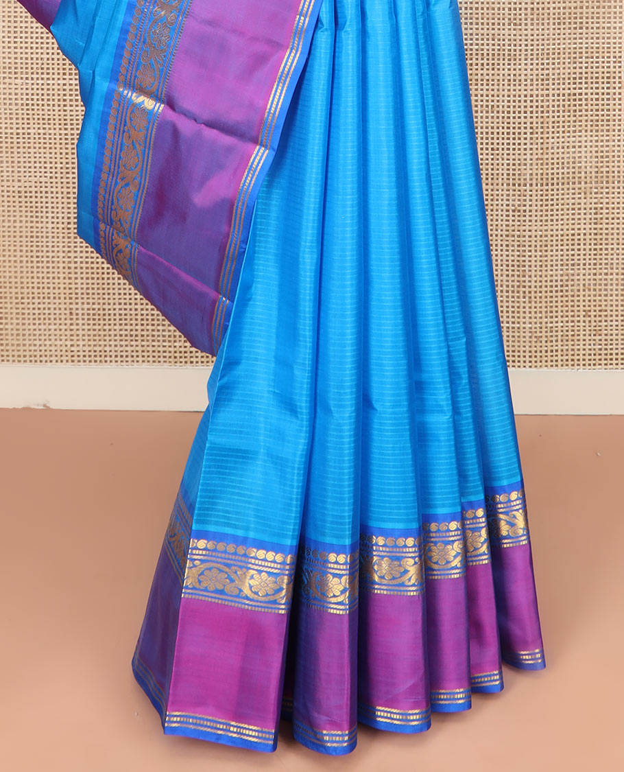 Blue Striped Kanchipuram Silk Saree Accentuated with Contrast Rettai Pettu Border Featuring Manga, Muthu, Banaras, and Kodi Visiry Designs, Subtly Woven Pallu with Stripes, and Paired with a Matching Blouse