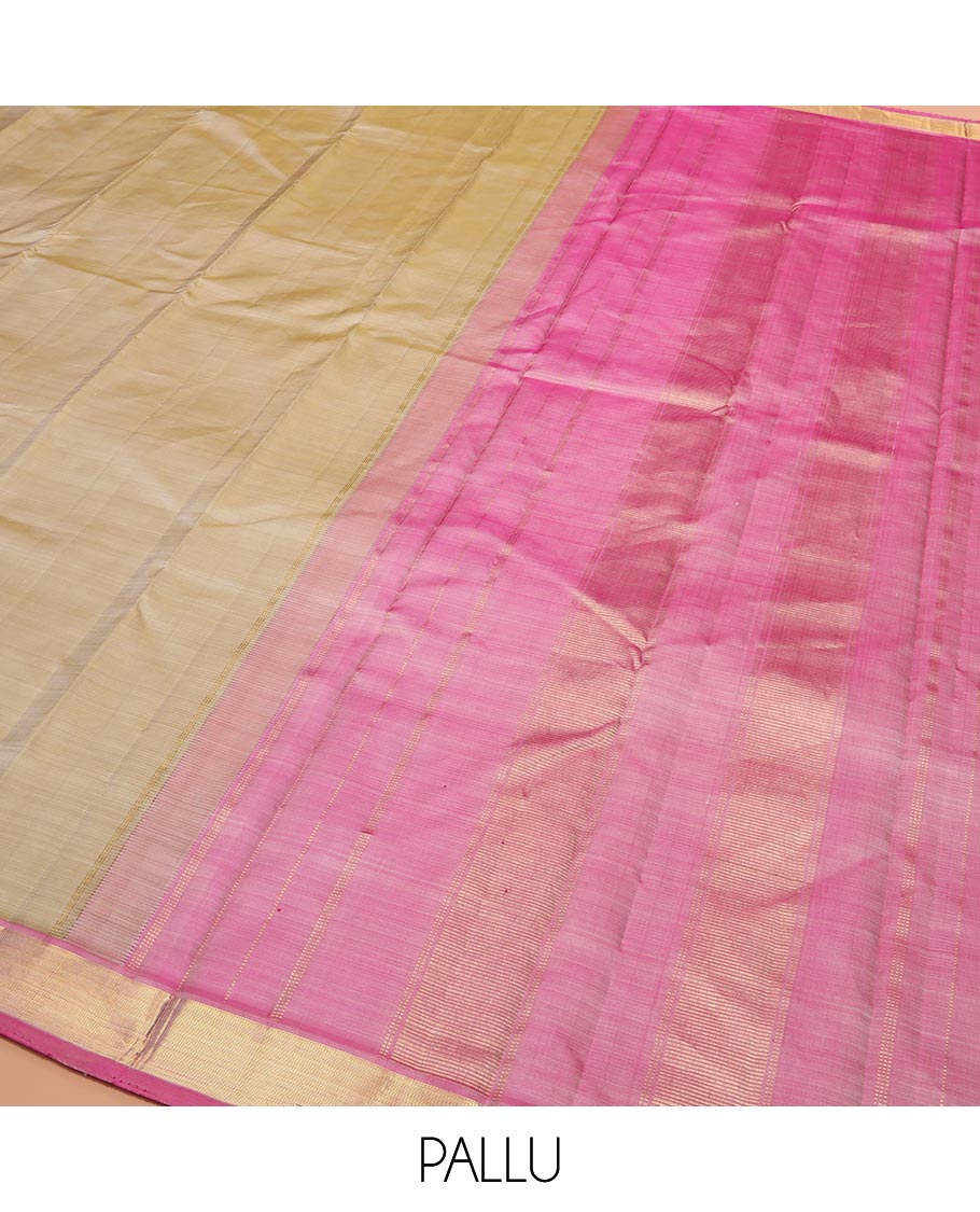 Light Sandal Plain Kanchipuram Silk Saree Subtly Sparkled with Contrast Zari Border, Pallu Features Zari Designs, and Paired with a Contrast Blouse