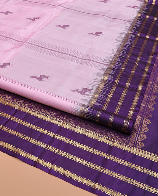 Baby Pink Kanchipuram Silk Saree Sparsely Sparkled Stripes and Deer Buttas, Complemented by a Contrast Varisai Pettu Border of Rekku, Muthu, Mayil Kann, Banaras, and Rudraksham Designs, Pallu Featuring Jaal Design, and Paired with a Contrast Blouse