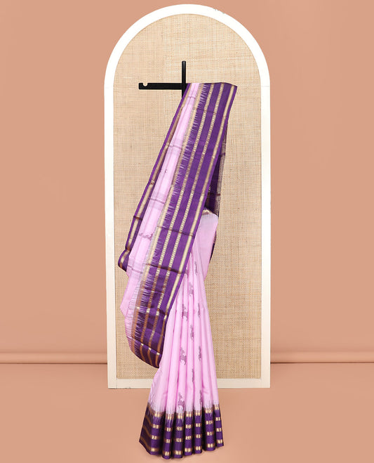 Baby Pink Kanchipuram Silk Saree Sparsely Sparkled Stripes and Deer Buttas, Complemented by a Contrast Varisai Pettu Border of Rekku, Muthu, Mayil Kann, Banaras, and Rudraksham Designs, Pallu Featuring Jaal Design, and Paired with a Contrast Blouse