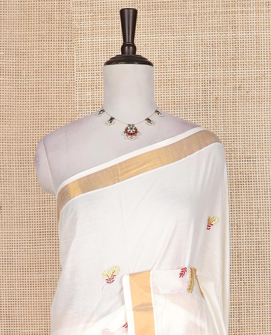 Cream paddy style motifs embroidered Kerala cotton saree, zari border, and paddy style motifs embroidered pallu