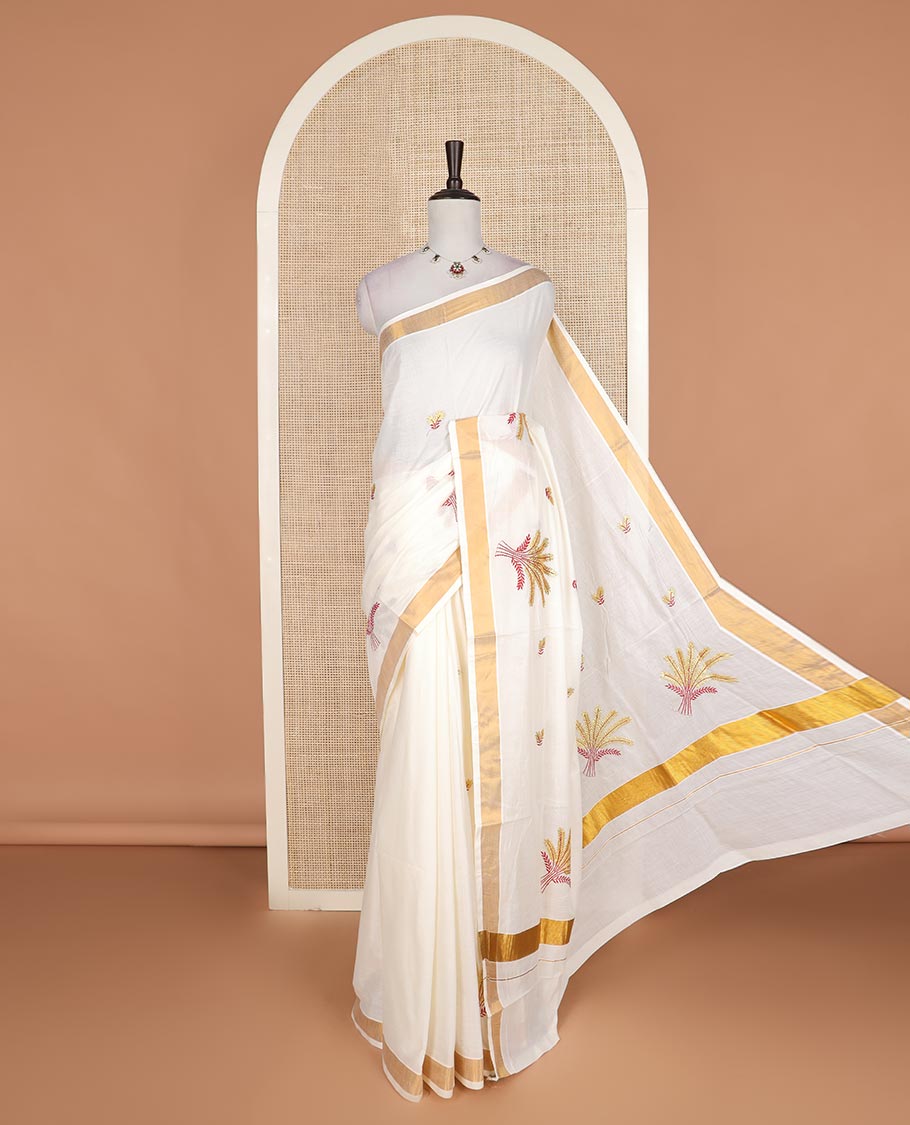Cream paddy style motifs embroidered Kerala cotton saree, zari border, and paddy style motifs embroidered pallu