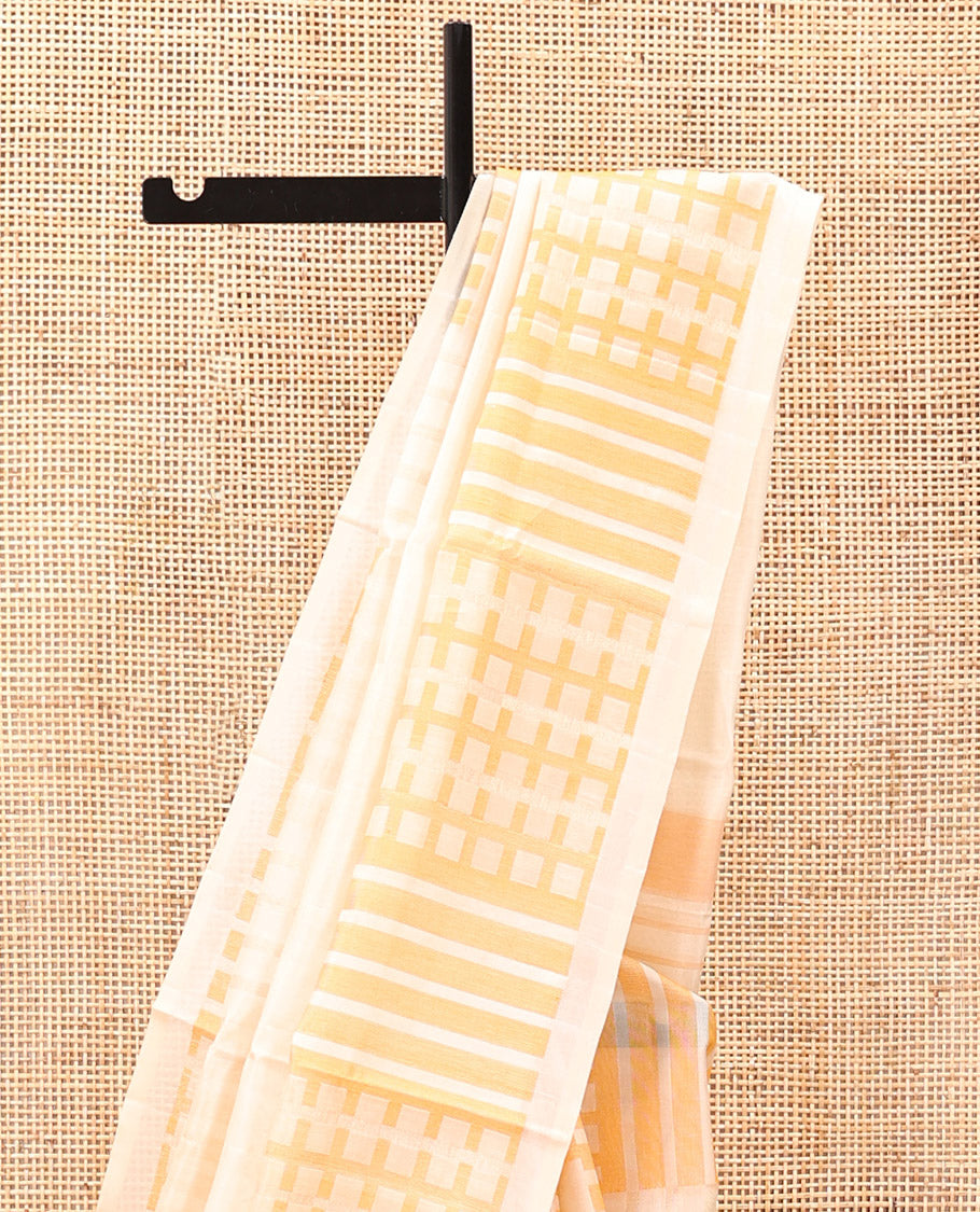 Borderless Cream Mayuri Soft Silk Saree, Boldly Accentuated with Checks On Its Body, Highlighted by Self-Pallu of Geometric Patterns, and Paired with a Matching Blouse