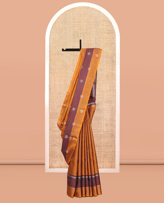 Orange Mayuri Lite Silk Mix Saree, Graced with Mayil and Chakram Zari Buttas, Complemented By Contrast Striped Border of Mayil Design, an Intricate Pallu, and a Contrast Blouse