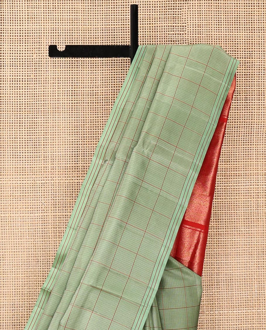 Green Mayuri Soft Silk Saree, Delicately Decked Up with Checks All Over Its Body, Striped Border, Captivating Contrast Pallu of Seppu Rekku Designs, and Paired with a Contrast Blouse