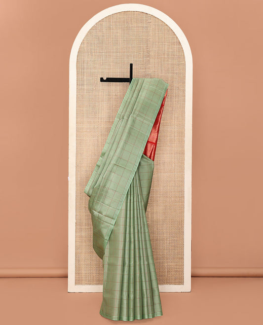 Green Mayuri Soft Silk Saree, Delicately Decked Up with Checks All Over Its Body, Striped Border, Captivating Contrast Pallu of Seppu Rekku Designs, and Paired with a Contrast Blouse