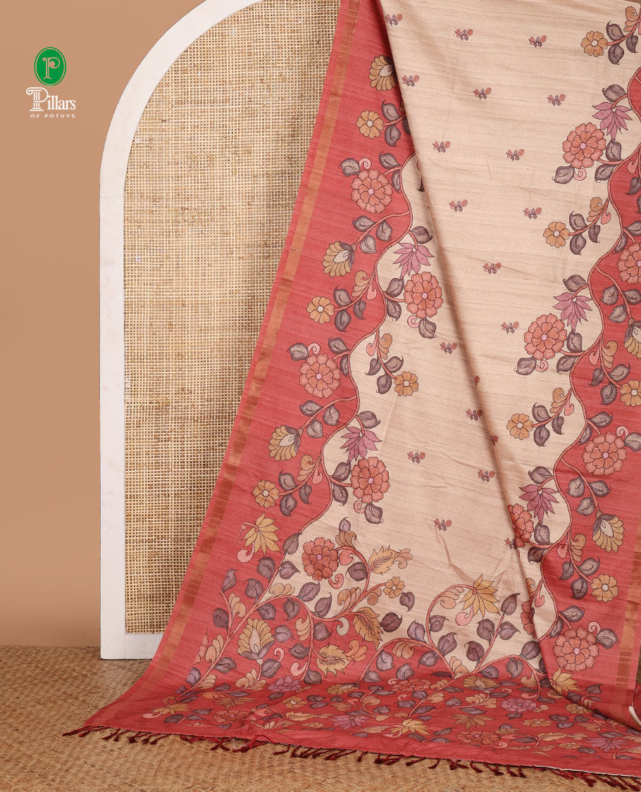 Cream floral motif printed katan silk saree, contrast orange-color border & pallu of kalamkari-style floral vine print