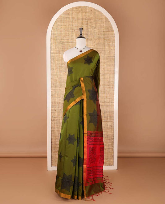 Olive green six-petal-like leaf motifs printed micro-silk saree, copper zari border, contrast intricate pallu & plain red blouse