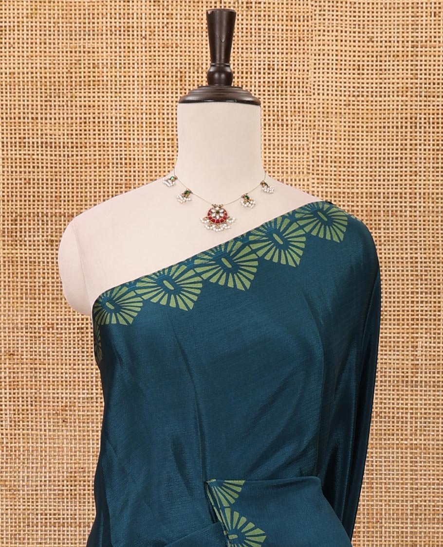 Ramar blue plain design turkey crepe saree, triangle motif printed border, leaf-like shape printed pallu & printed blouse