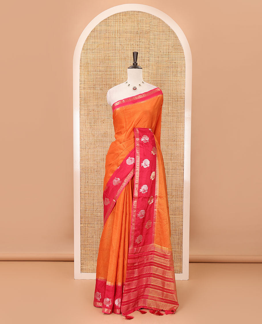 Orange plain Banarasi tissue silk saree, contrast traditional zari peacock border, zari striped pallu & floral jaal jacquard red blouse