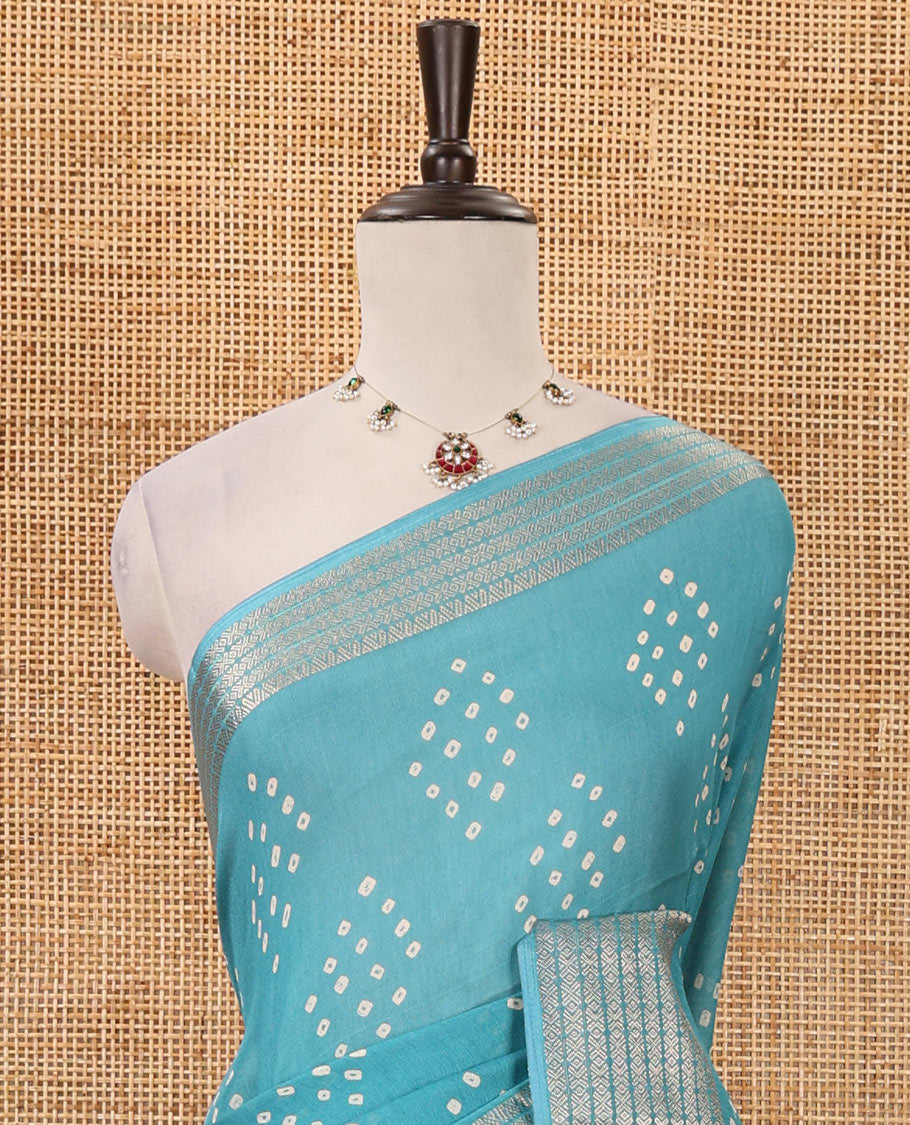Blue Bandhani motifs printed viscose moss chiffon saree, zari design border, shibori-style pallu & blouse of zari & print work