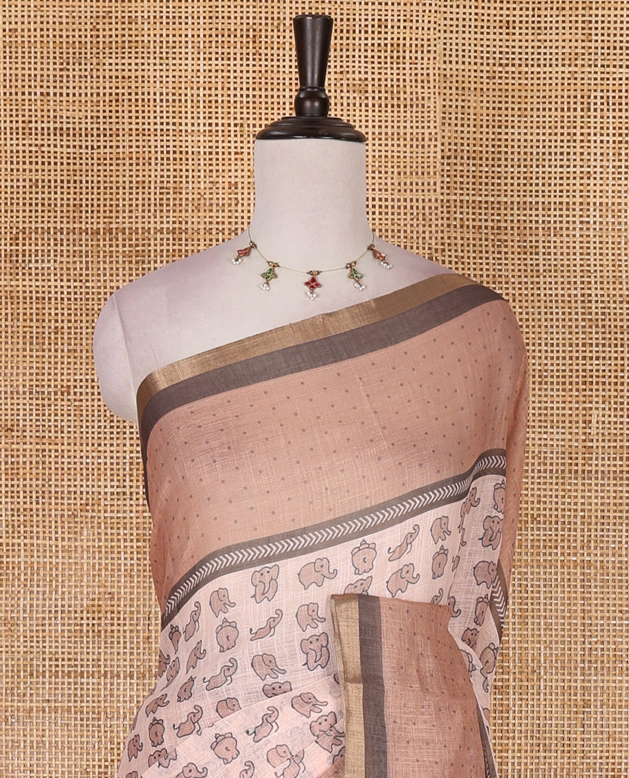 Peach cute elephant motifs printed linen cotton saree, contrast chevron border, pallu of stripes and chevron, and contrast printed blouse