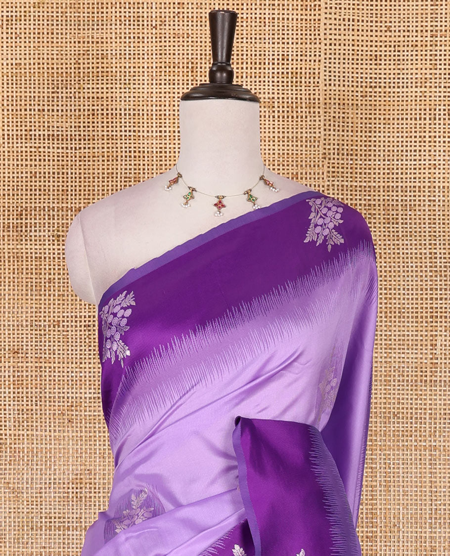 Lavender-violet floral buttas elite soft silk saree, contrast floral buttas border, and pallu of Mughal-style intricate zari designs