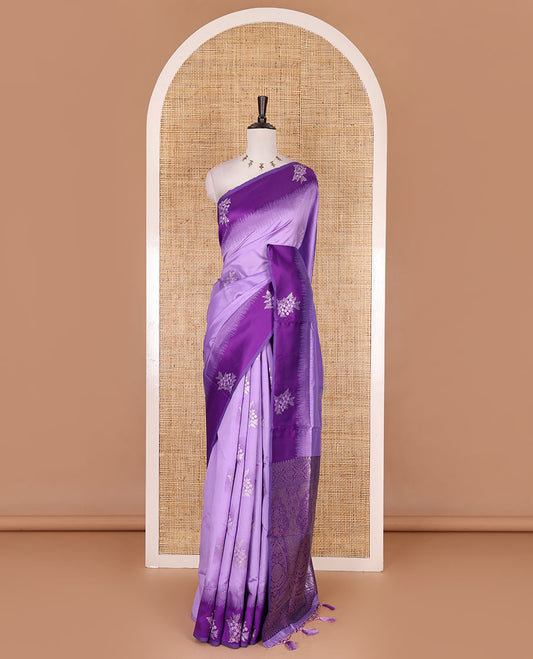 Lavender-violet floral buttas elite soft silk saree, contrast floral buttas border, and pallu of Mughal-style intricate zari designs