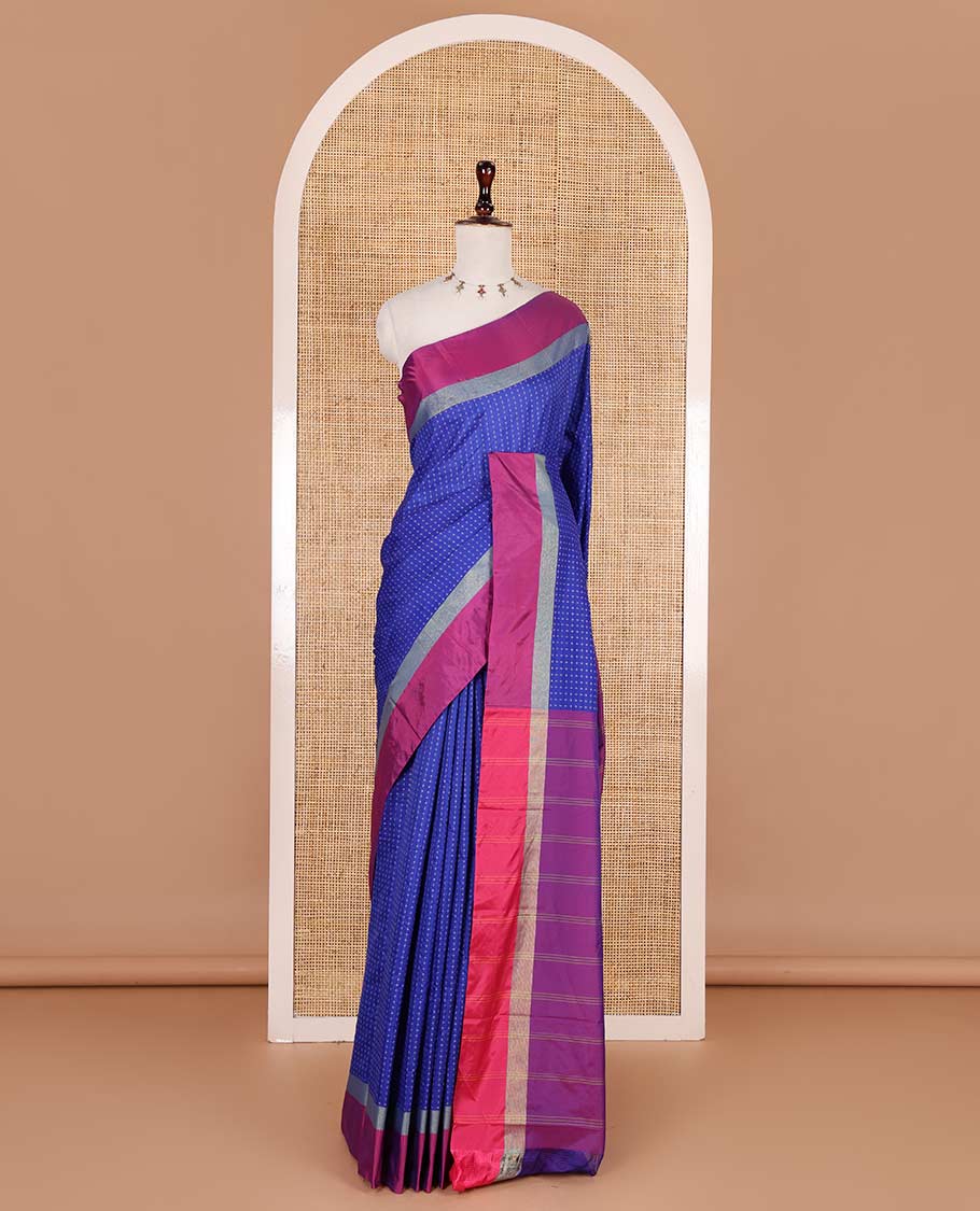 Royal blue-pink plus-shaped buttas steeped semi-soft silk saree, contrast satin border of stripes, striped pallu, and contrast blouse
