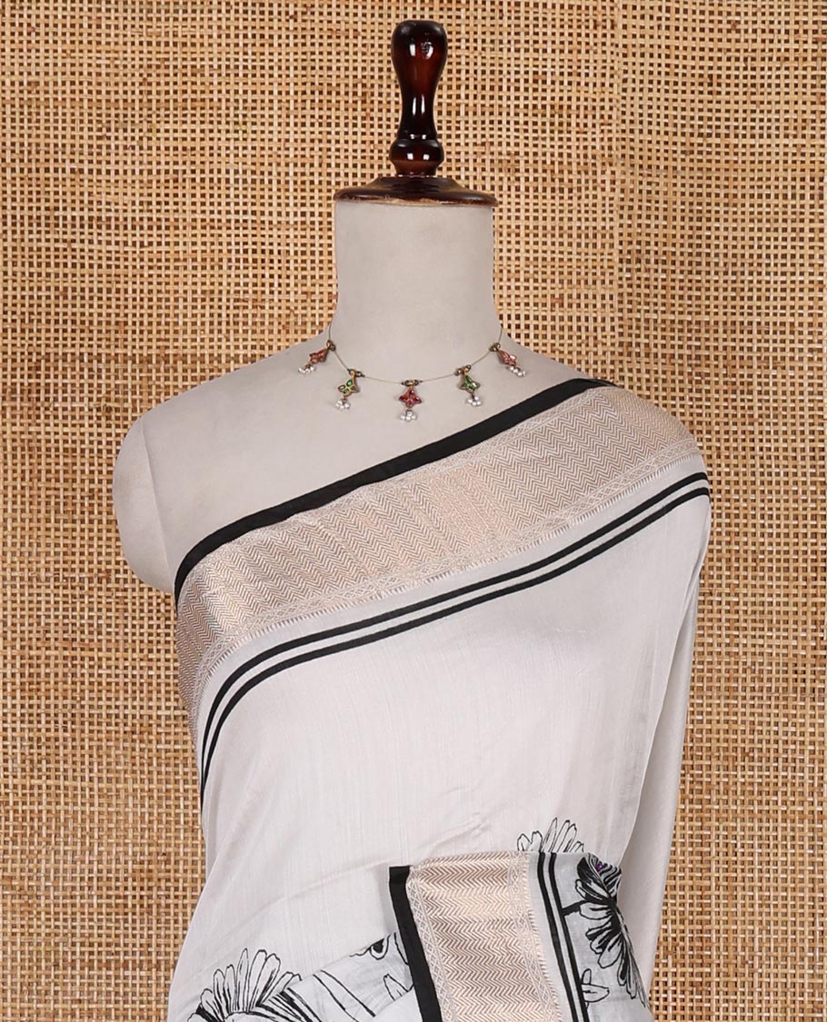 White sunflower floral printed assam cotton saree, zari border of traditional motifs, striped pallu, and contrast blouse