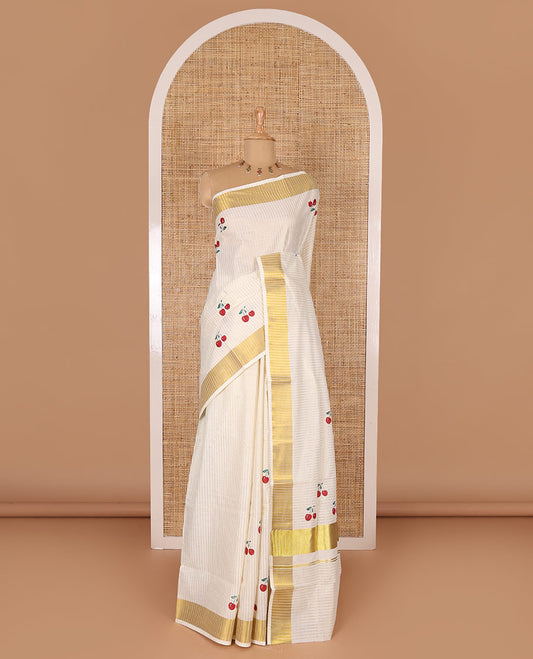 Cream-red vertically striped and cherry fruit motifs printed Kerala cotton saree with zari striped border, printed pallu, and a matching blouse