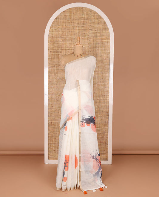 Cream sun and deer silhouette printed linen cotton saree, gold zari piping border, printed pallu, and a matching stripes printed blouse
