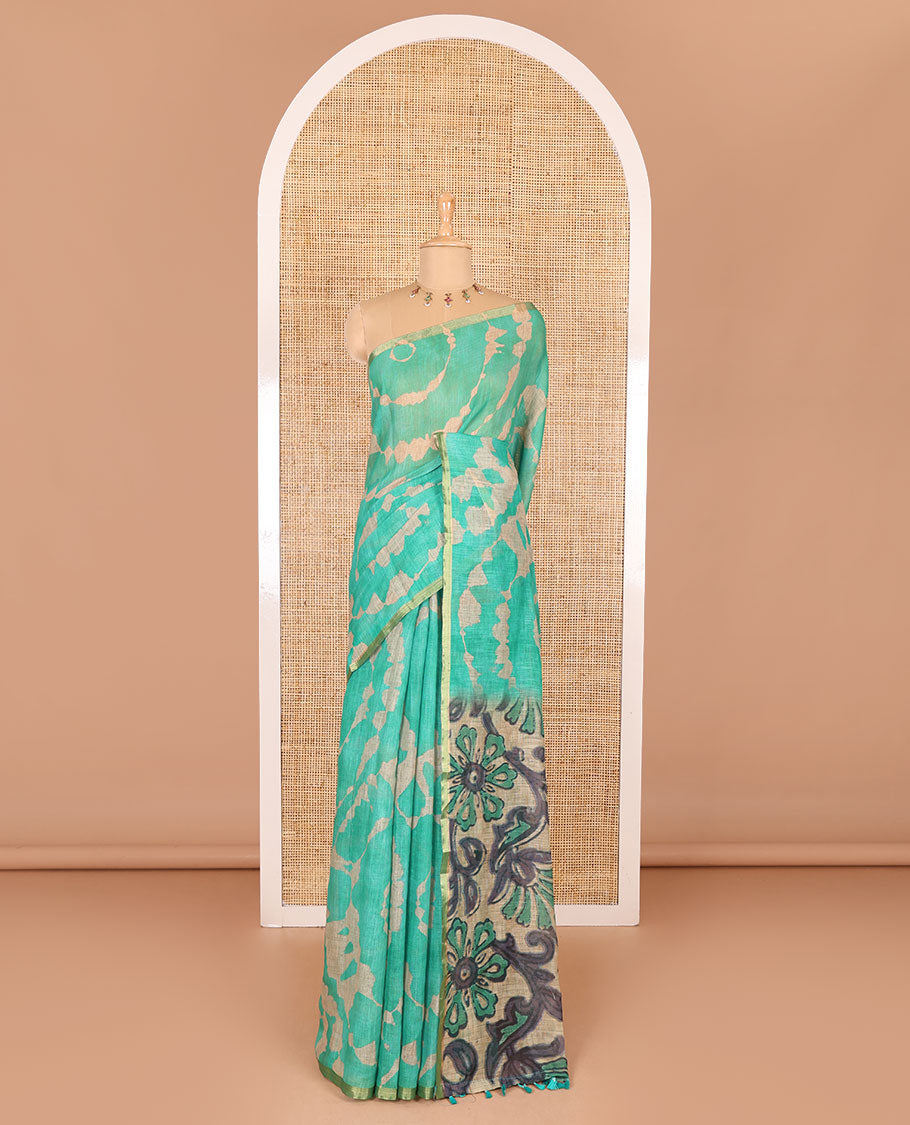 Borderless green batik printed linen cotton saree, hand brush painting style floral vine printed pallu, and contrast floral printed blouse